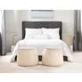 Round Beige Faux Leather Ottoman with Pull Tab