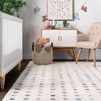 Behati High-Low Polka Dot Tassel Area Rug