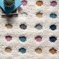Behati High-Low Polka Dot Tassel Area Rug