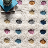Behati High-Low Polka Dot Tassel Area Rug