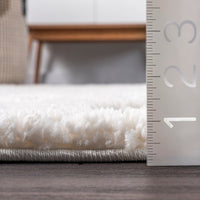 Behati High-Low Polka Dot Tassel Area Rug