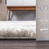 Behati High-Low Polka Dot Tassel Area Rug